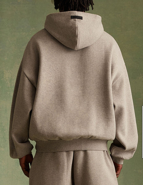 Fear of God Essentials Hoodie FW23 in Core Heather