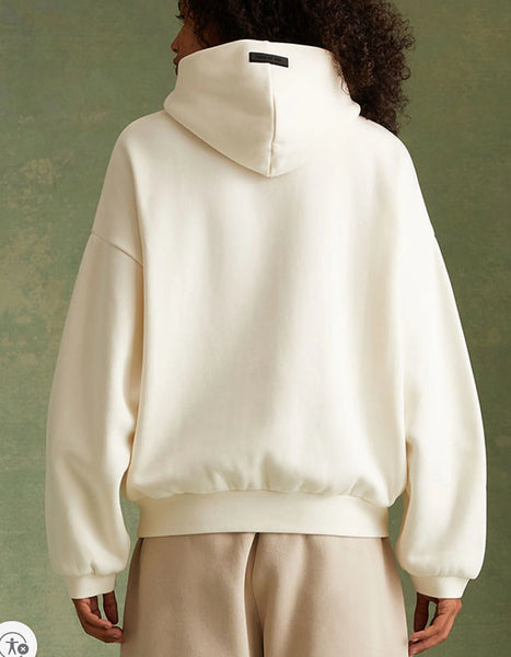 Fear of God Essentials Hoodie FW23 in Cloud Dance